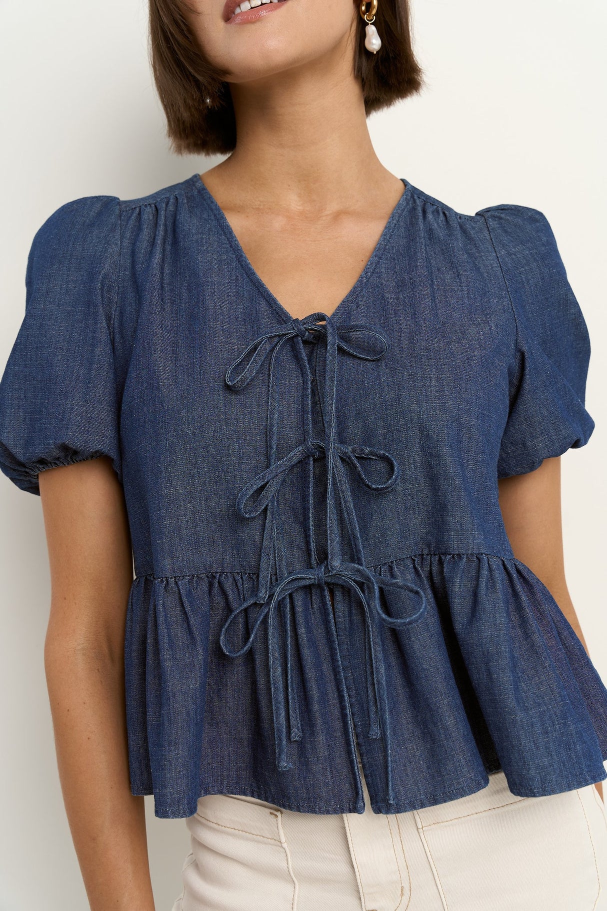 Flo & Frankie Ladies Restore Storm Blue Chambray Tie Front Peplum Short Sleeve Top