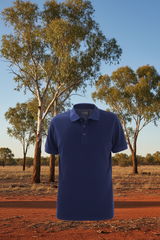 Man wearing Ritemate Pilbara Classic Polo in French Navy with Australian outback background
