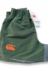 Olive green Canterbury kids Harletic shorts with orange logo on a plain white background